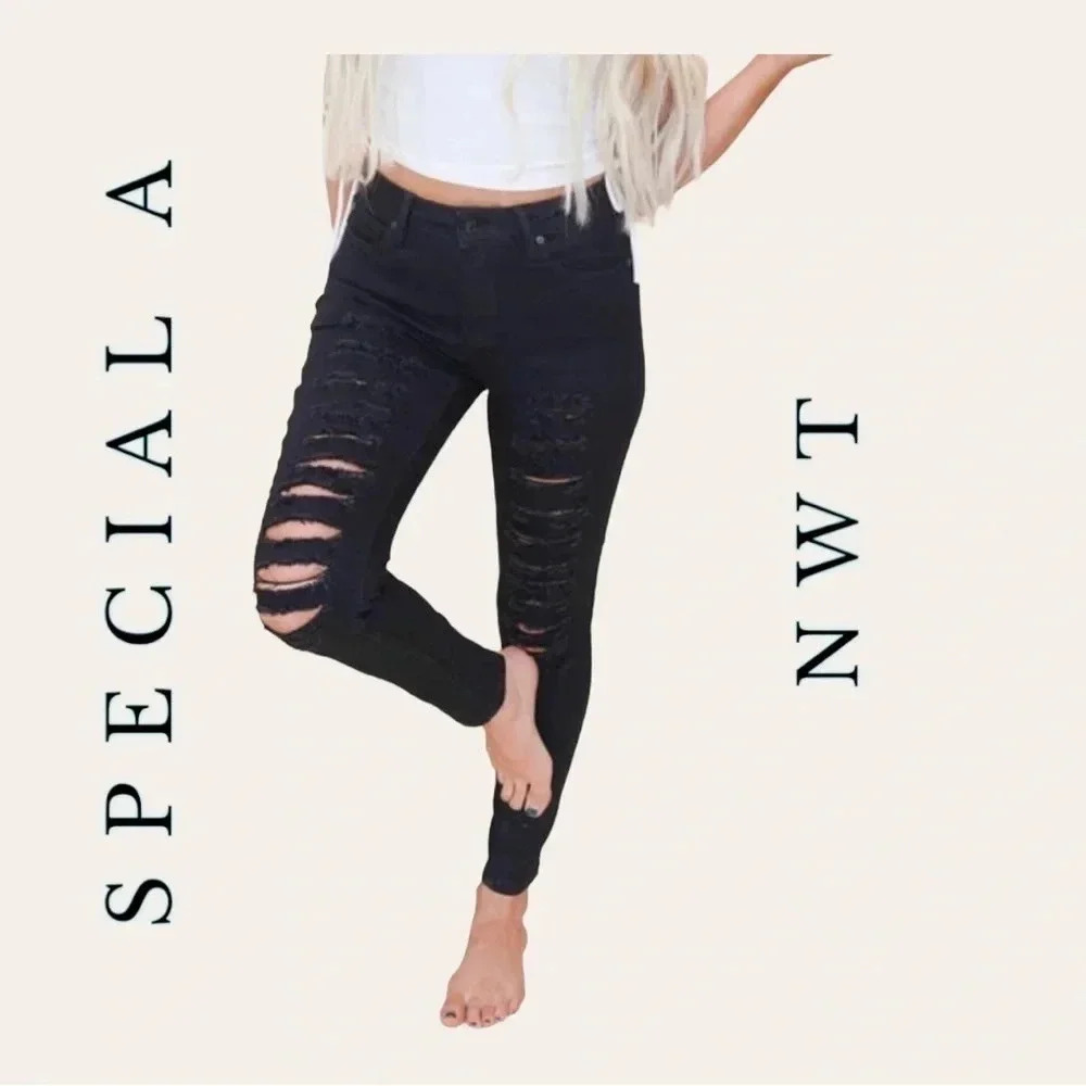 0546. SPECIAL A DISTRESSED DENIM JEANS SIZE 1 BLACK IN COLOR